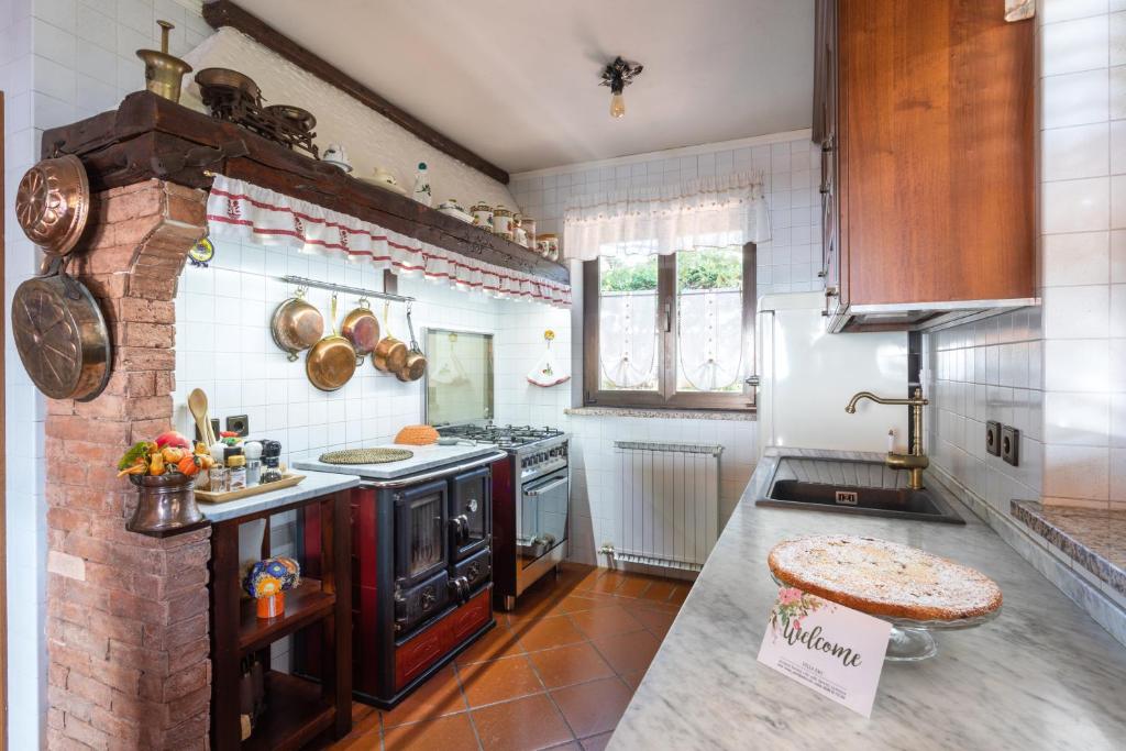 Kuchyň nebo kuchyňský kout v ubytování Villa EMI