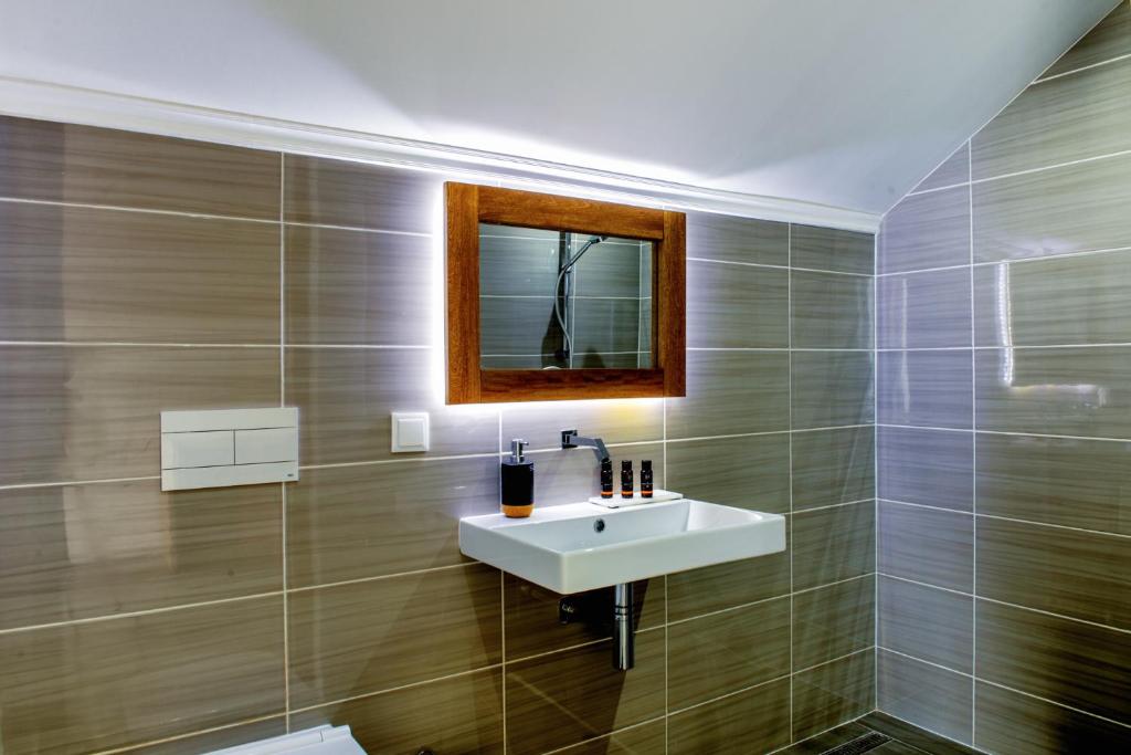 Koupelna v ubytování Art Hotel