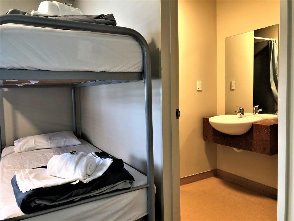 Postel nebo postele na pokoji v ubytování Kaiteri Lodge