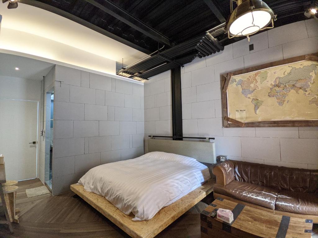 מיטה או מיטות בחדר ב-阡陌-頂加民宿