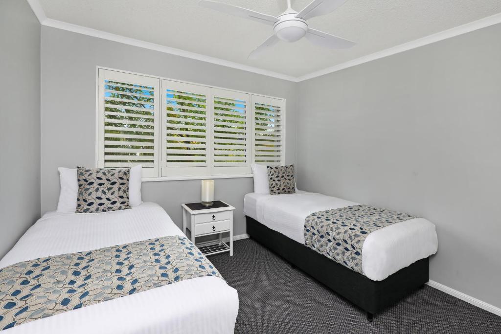 Postel nebo postele na pokoji v ubytování Dockside Apartments Mooloolaba