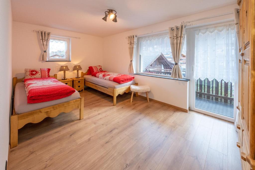Postel nebo postele na pokoji v ubytování Touring Chez Georges