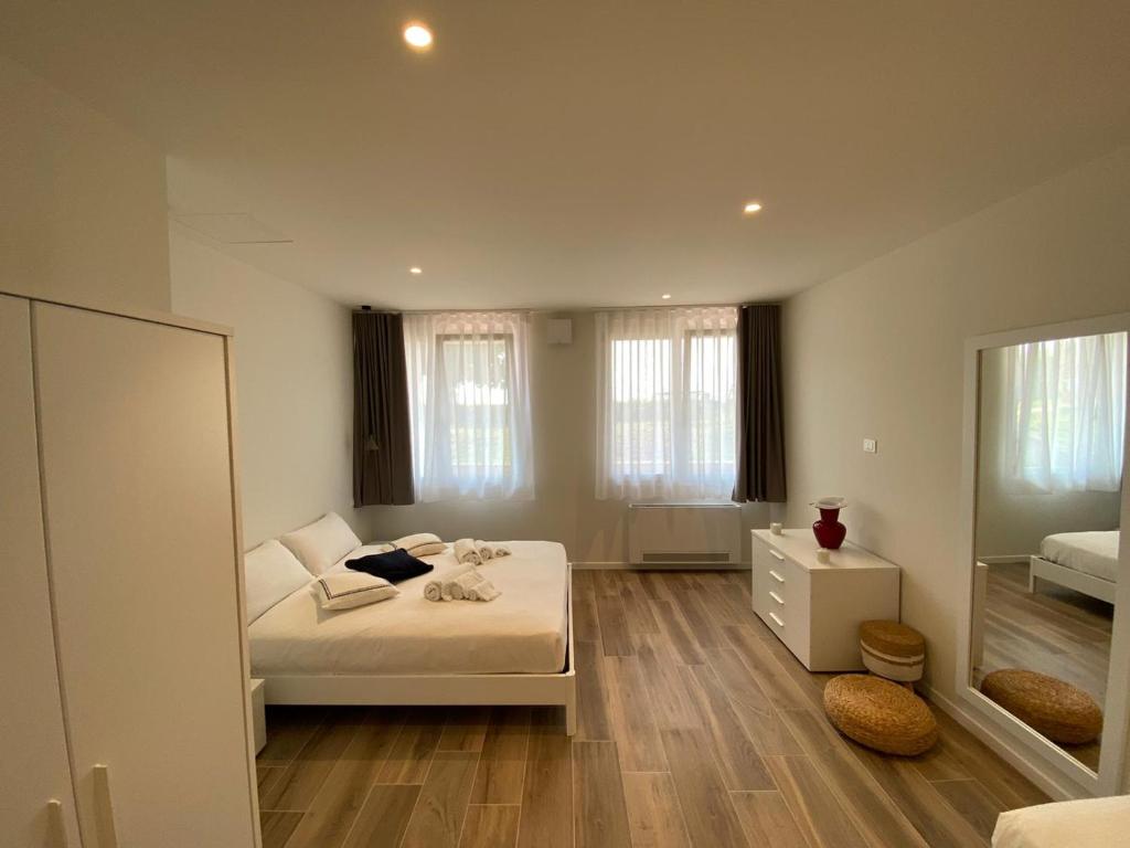 Een bed of bedden in een kamer bij Appartamenti Villa Andrea