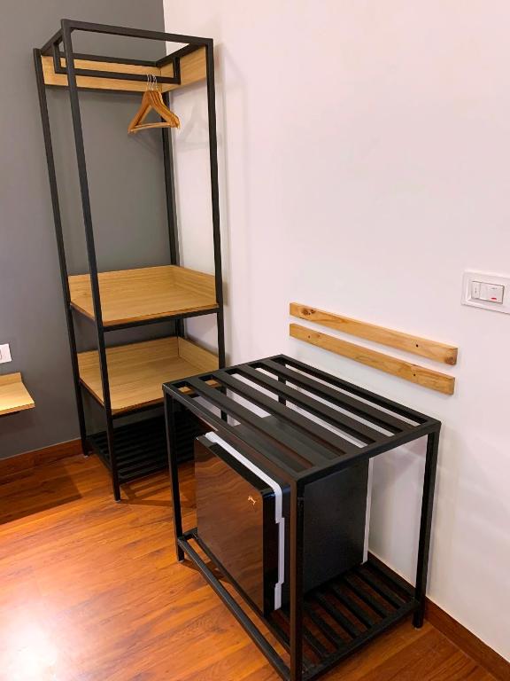 Palanda nebo palandy na pokoji v ubytování Loft 24, Mansarovar