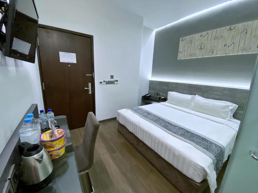Bliss Hotel Singaporeにあるベッド