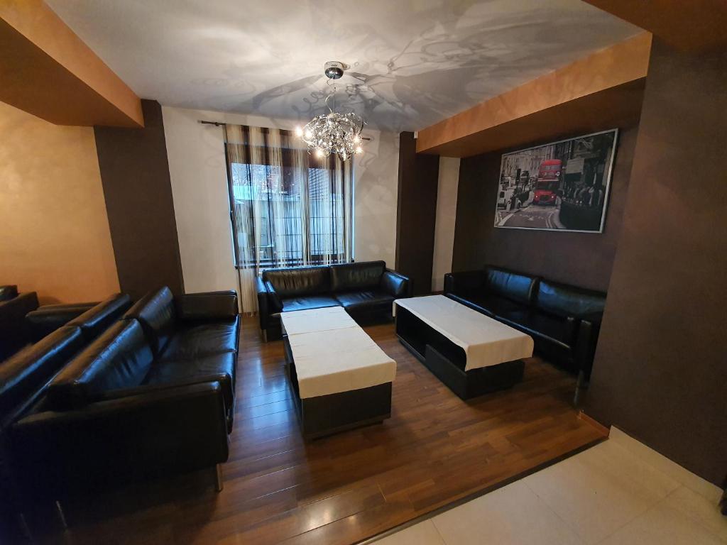 Ένα ή περισσότερα κρεβάτια σε δωμάτιο στο Pensiunea Public House