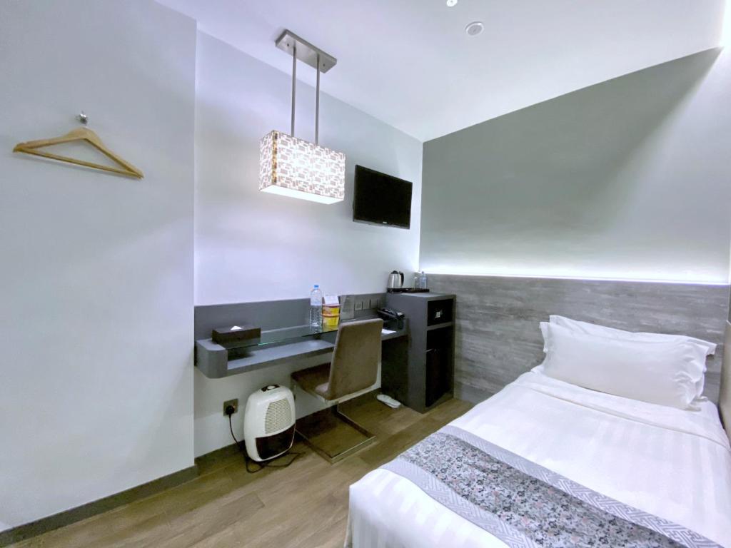 Bliss Hotel Singaporeにあるベッド