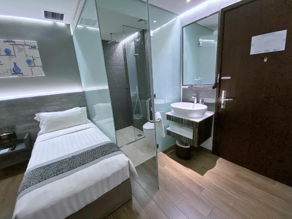 Bliss Hotel Singaporeにあるバスルーム