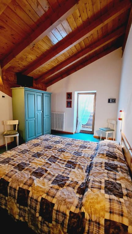 Postel nebo postele na pokoji v ubytování Hotel Martinella