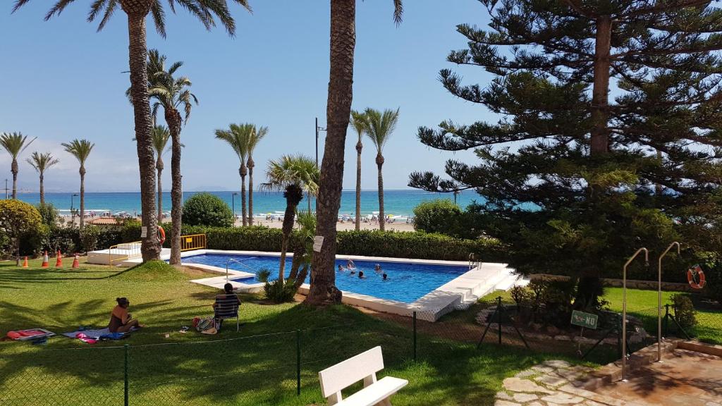 The swimming pool at or close to Loft Playa Muchavista