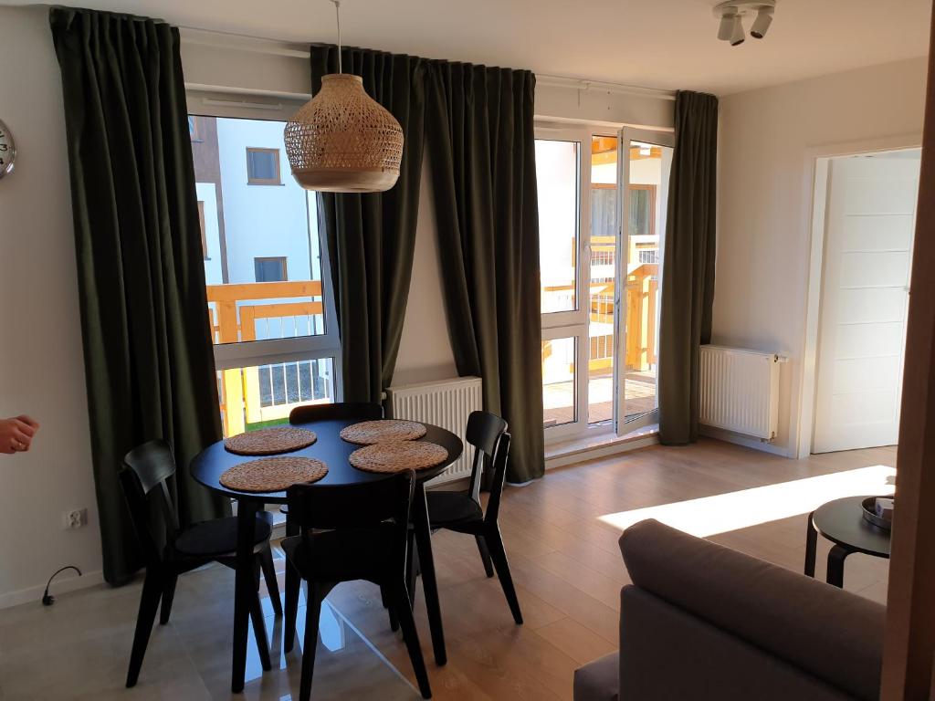 Posedenie v ubytovaní Apartament Zielony