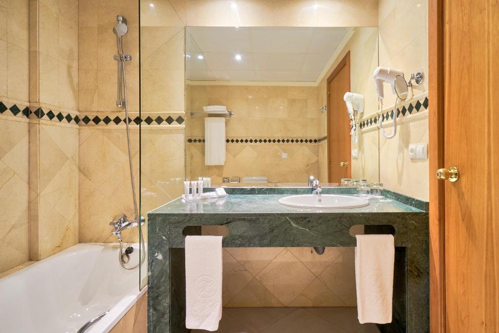 Un baño de Exe Ciudad de Córdoba