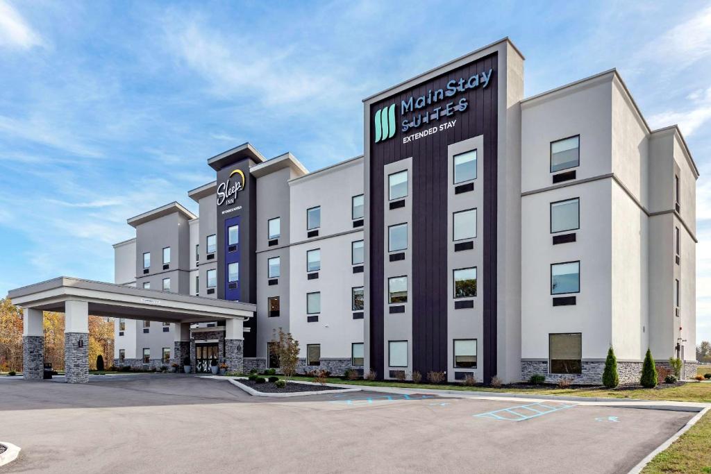 a rendering of the front of a hotel at MainStay Suites Newberry - Crane in Odon