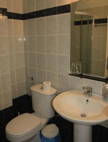 Koupelna v ubytování Esperanza Hotel