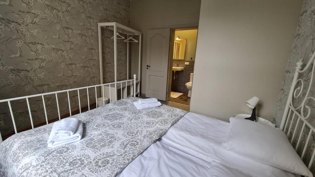 Postel nebo postele na pokoji v ubytování Blue Bird Hostel in Riga Old Town