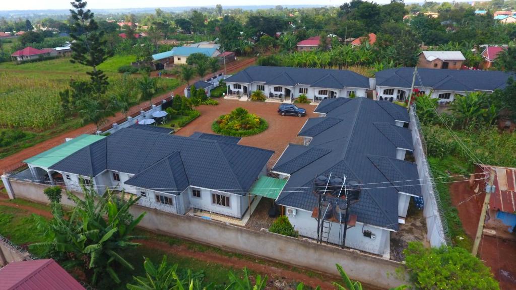 an aerial view of a house with roofs at MAMIKKI Hotel Apartments in Tororo