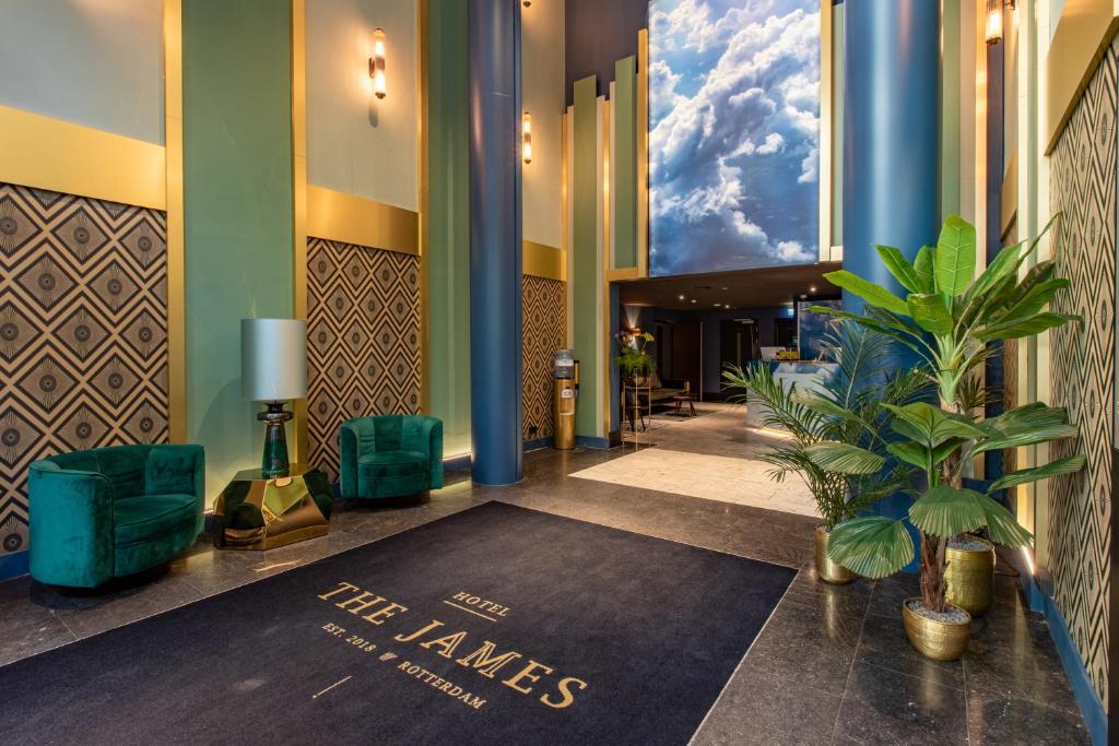 a hotel lobby with a welcome mat on the floor at The James Rotterdam in Rotterdam