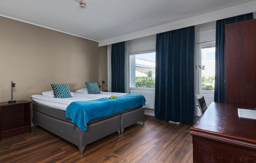 Postel nebo postele na pokoji v ubytování Apple Hotel & Konferens Göteborg