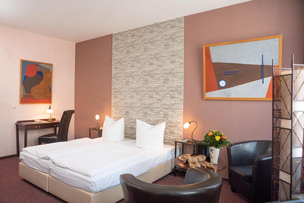 Postel nebo postele na pokoji v ubytování Hotel Adagio