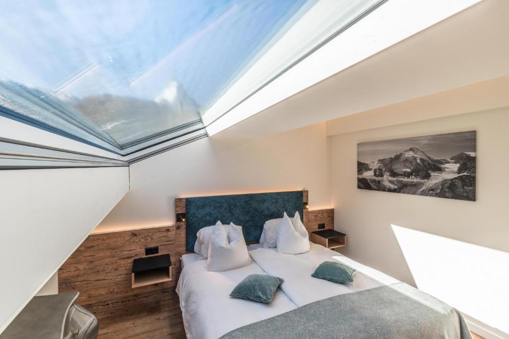 Postel nebo postele na pokoji v ubytování Hotel Hemizeus & Iremia Spa