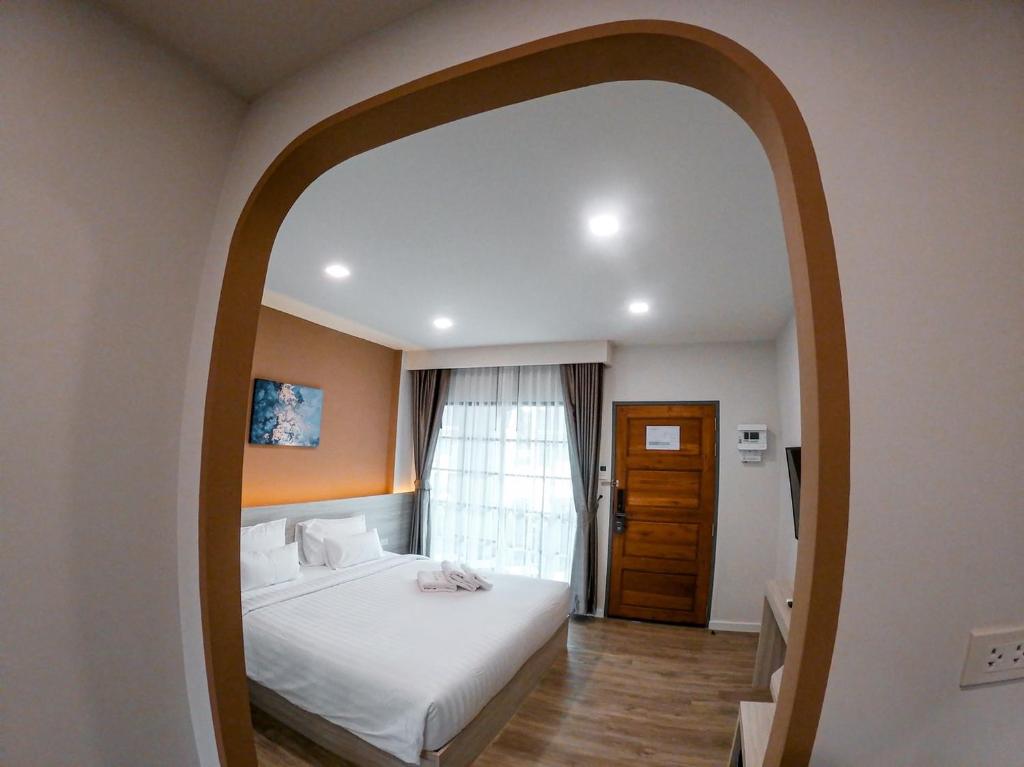 Postel nebo postele na pokoji v ubytování Li CALLA Resort Trat