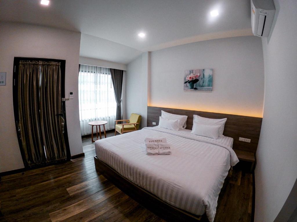 Postel nebo postele na pokoji v ubytování Li CALLA Resort Trat