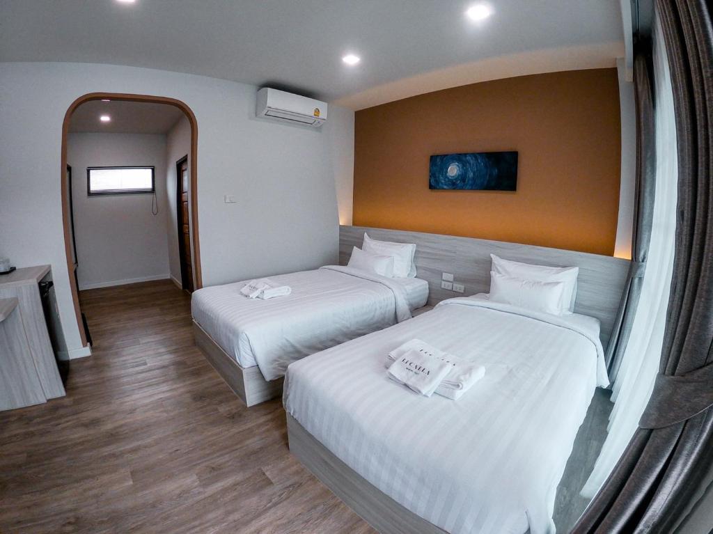 Postel nebo postele na pokoji v ubytování Li CALLA Resort Trat