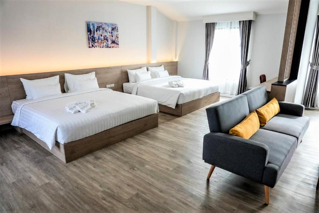 Postel nebo postele na pokoji v ubytování Li CALLA Resort Trat