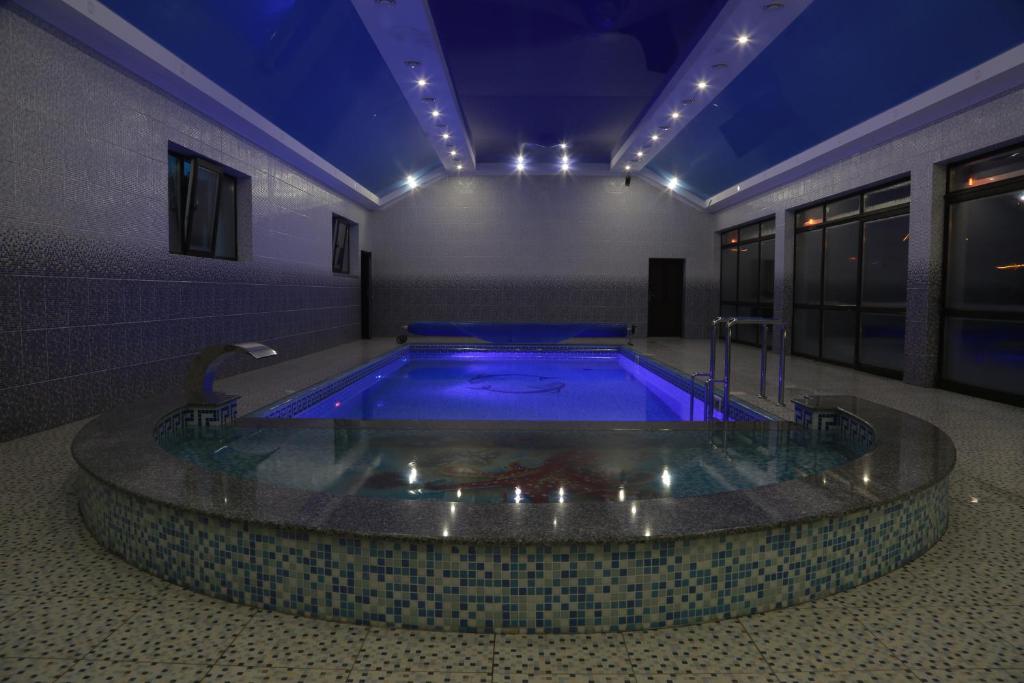 Bazén v ubytování Hotel Ashad nebo v jeho okolí