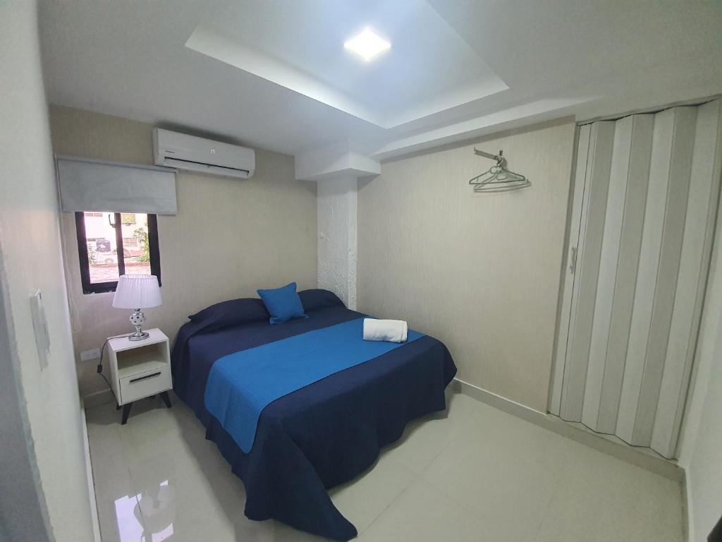 Postel nebo postele na pokoji v ubytování Malecon Premium Rooms & Hotel