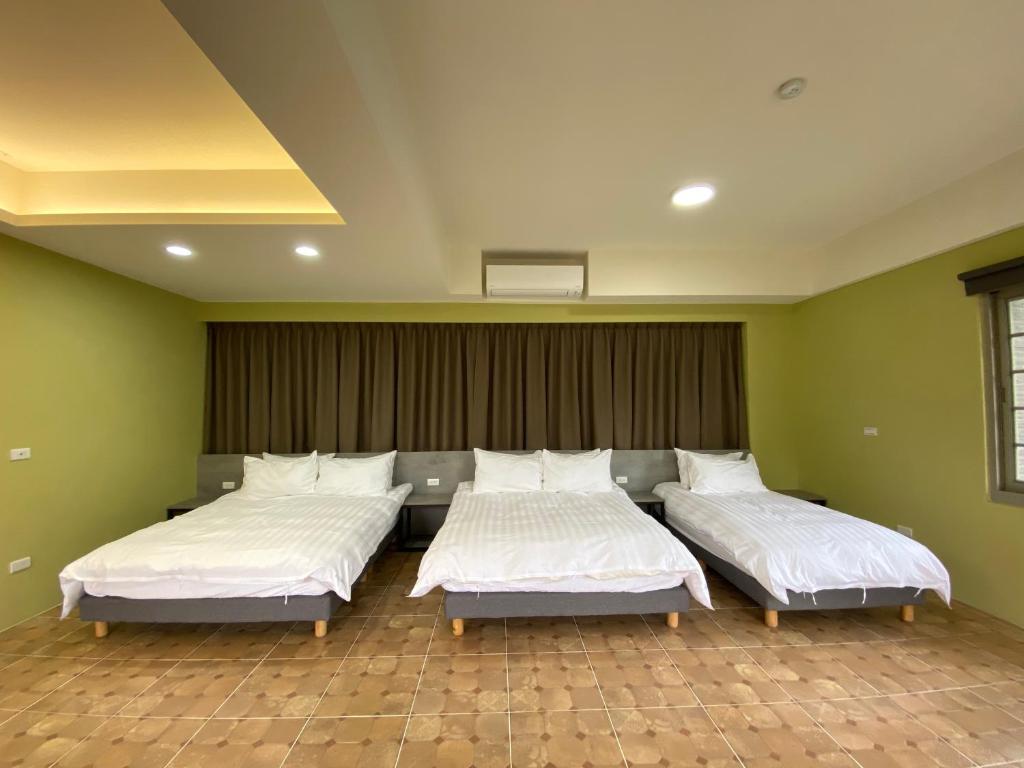 Postel nebo postele na pokoji v ubytování Sitou ARCADIA Homestay