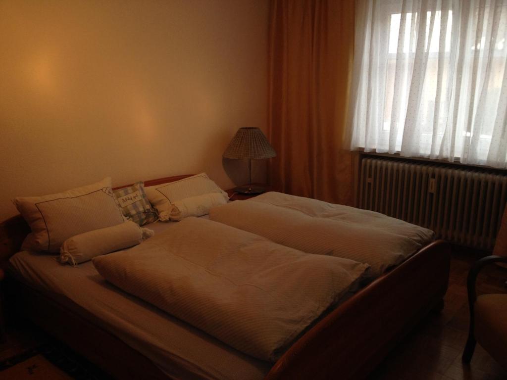 Postel nebo postele na pokoji v ubytování Gästehaus Stapf