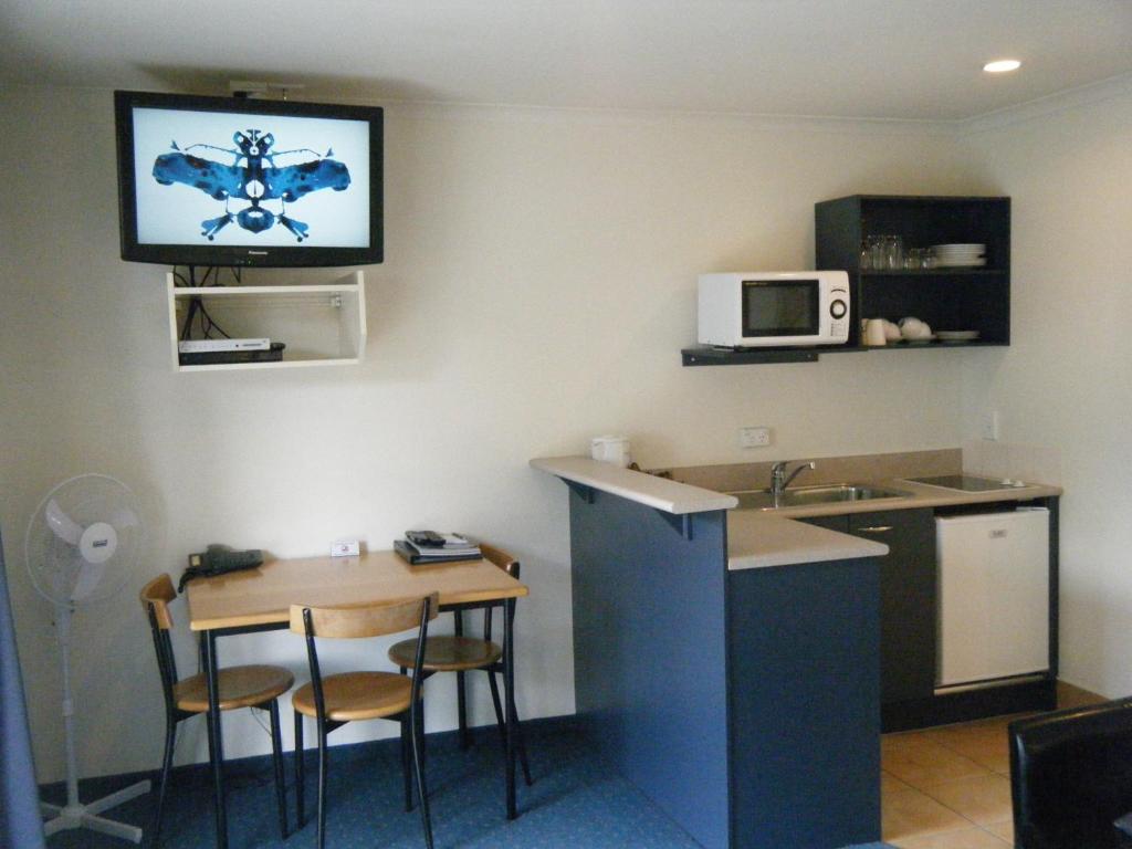 Kuchyň nebo kuchyňský kout v ubytování Stadium Motel