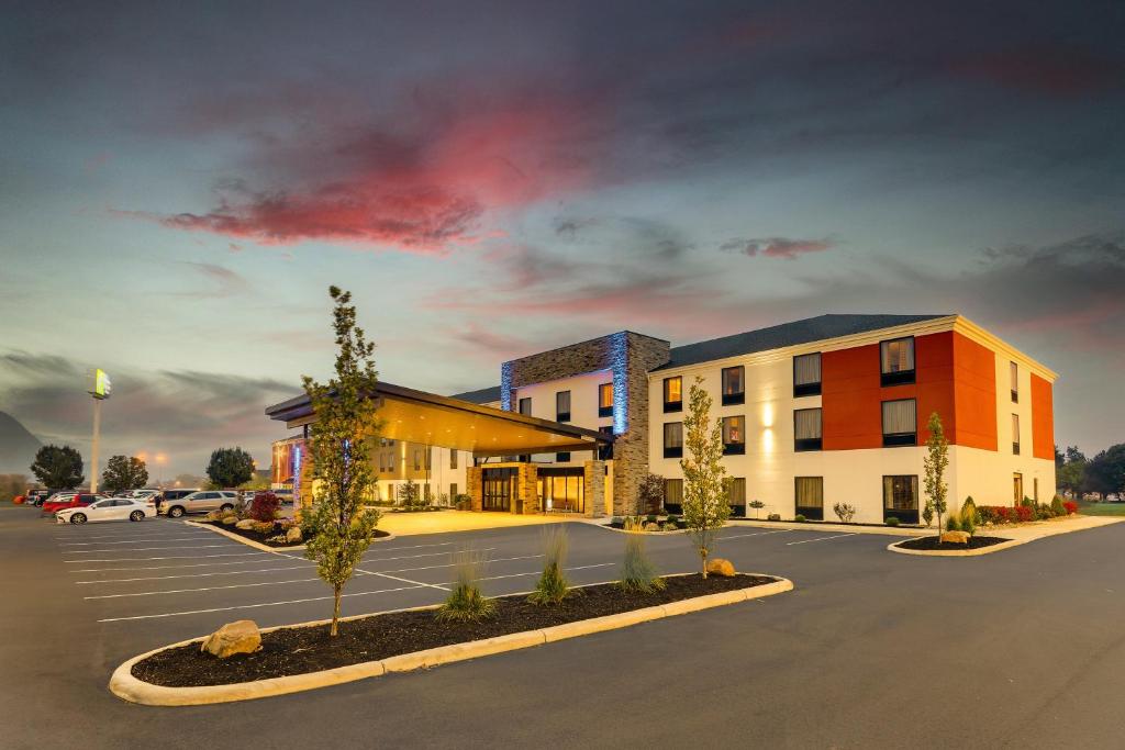 a rendering of a hotel with a parking lot at Holiday Inn Express & Suites Troy, an IHG Hotel in Troy