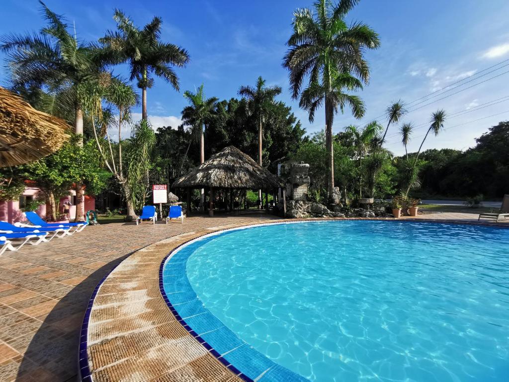 Piscina a Hotel Doralba Inn Chichen o a prop
