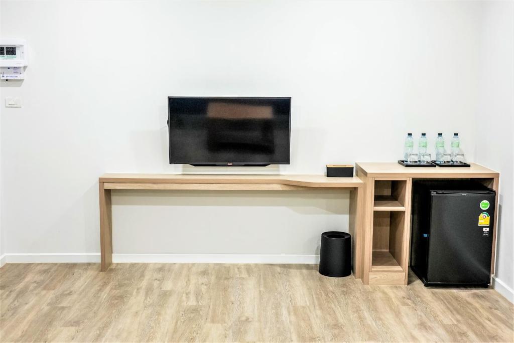 TV a/nebo společenská místnost v ubytování Li CALLA Resort Trat