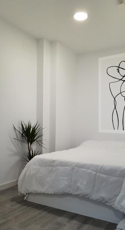 Postel nebo postele na pokoji v ubytování Apartamento en el absoluto centro 2B
