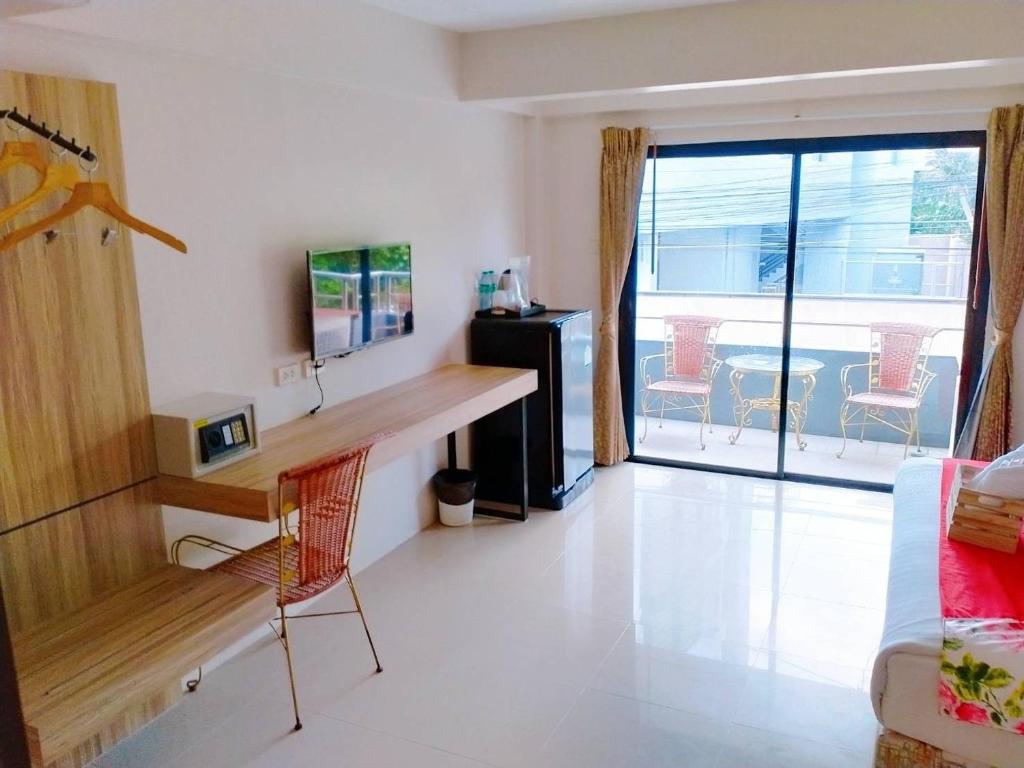 Kuchyň nebo kuchyňský kout v ubytování Fortune Pattaya Resort
