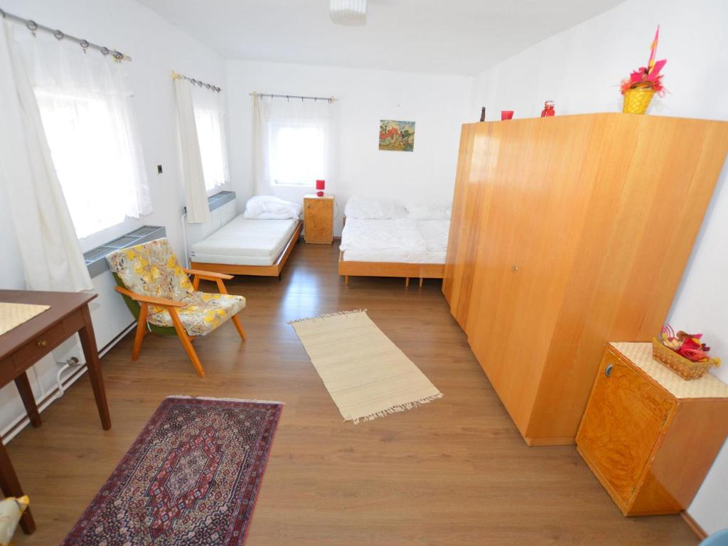 Postel nebo postele na pokoji v ubytování Vacation House Featuring Sauna