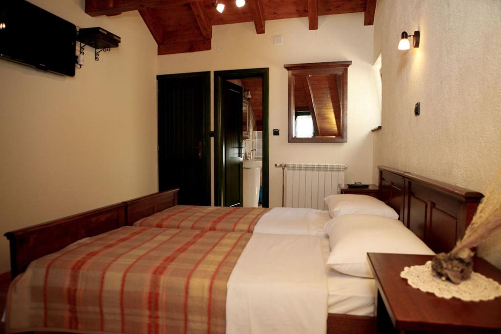מיטה או מיטות בחדר ב-Stein House Marasovic
