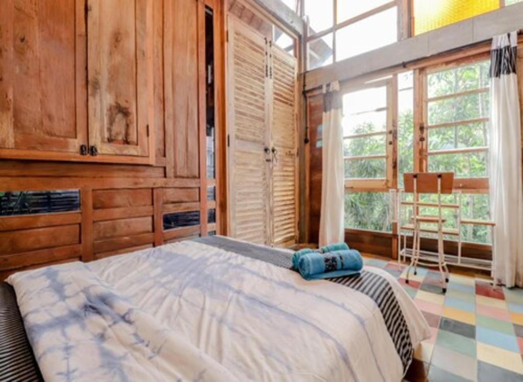 Postel nebo postele na pokoji v ubytování Lorong Homestay