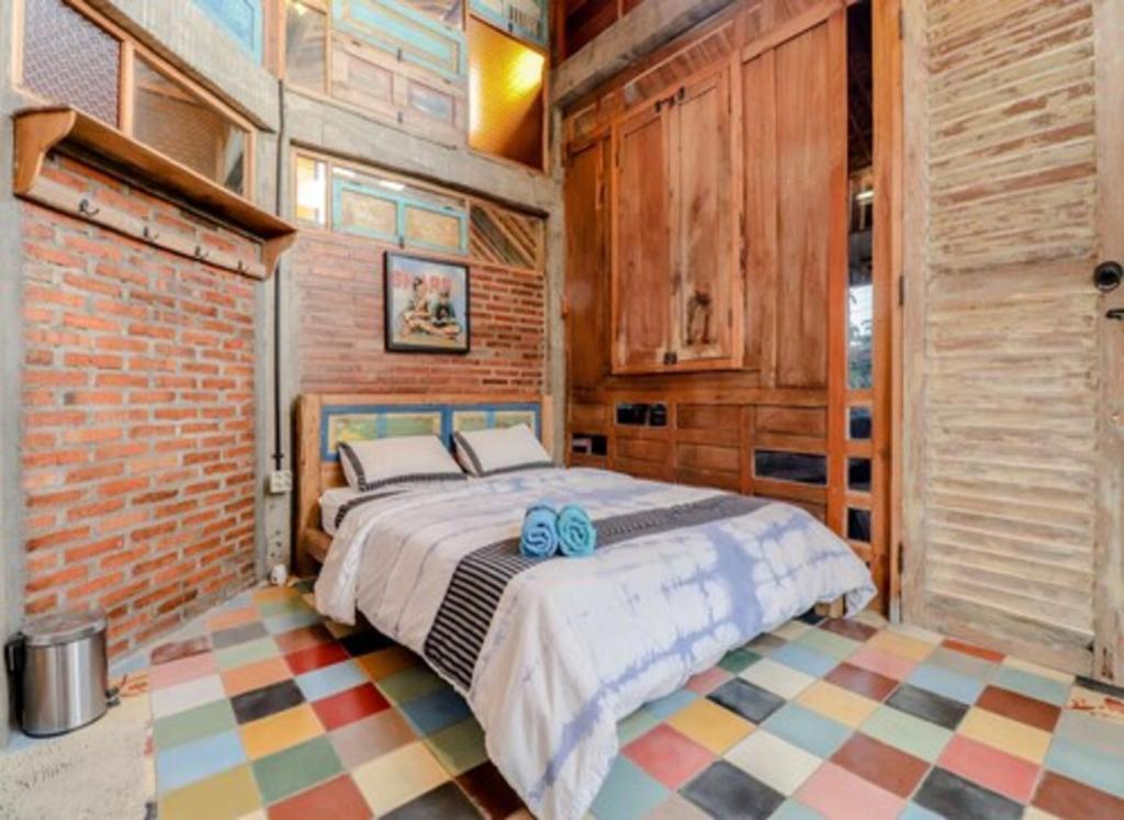 Postel nebo postele na pokoji v ubytování Lorong Homestay