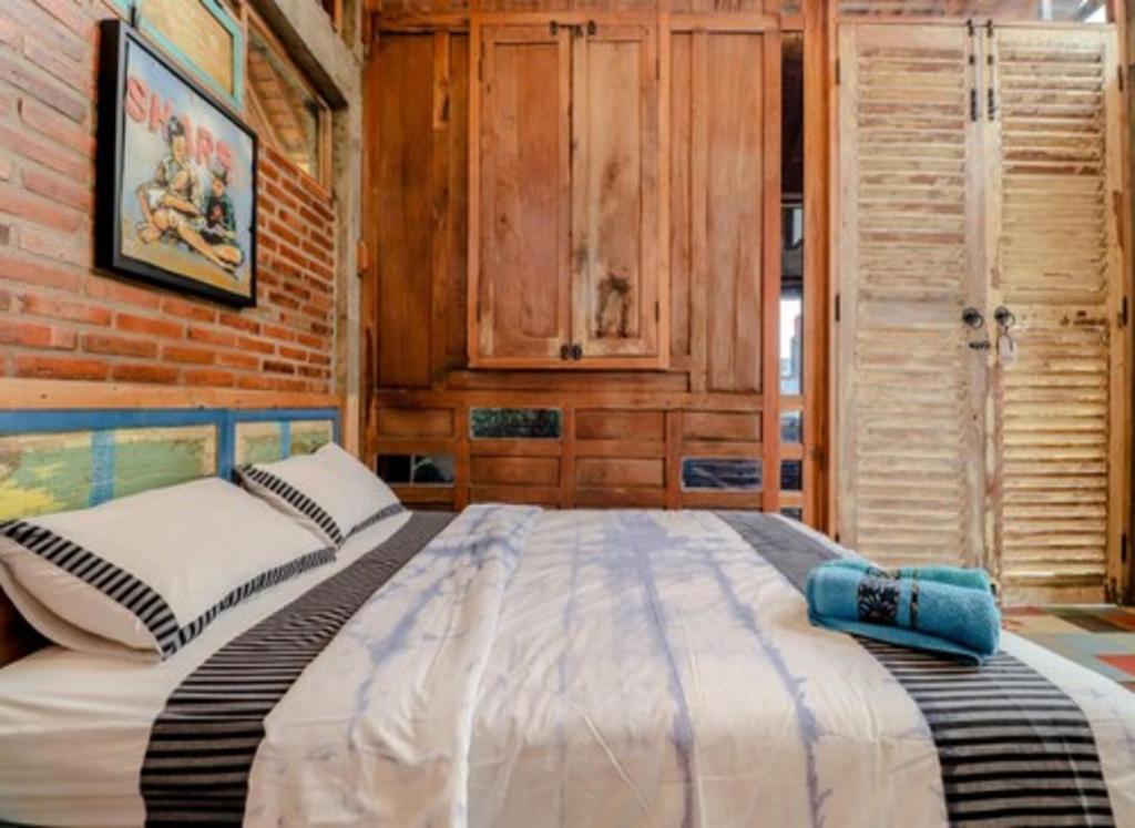 Postel nebo postele na pokoji v ubytování Lorong Homestay