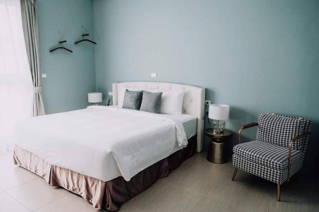 Postel nebo postele na pokoji v ubytování 禾旅宿Ho Hostel 墾丁夢幻島