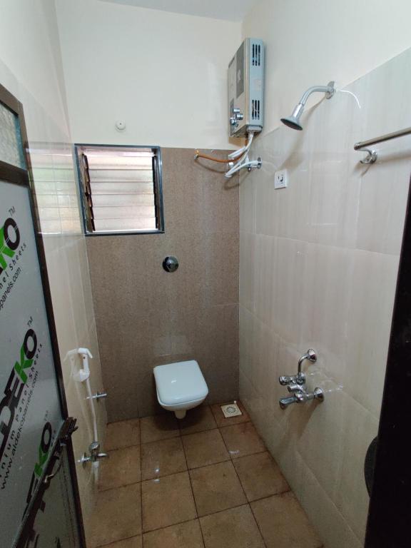 Koupelna v ubytování Bandekar Home Stay