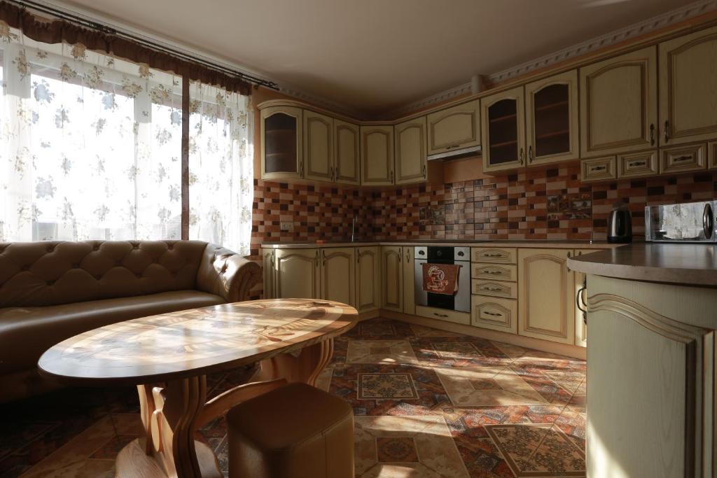 Kuchyň nebo kuchyňský kout v ubytování Hotel Ashad