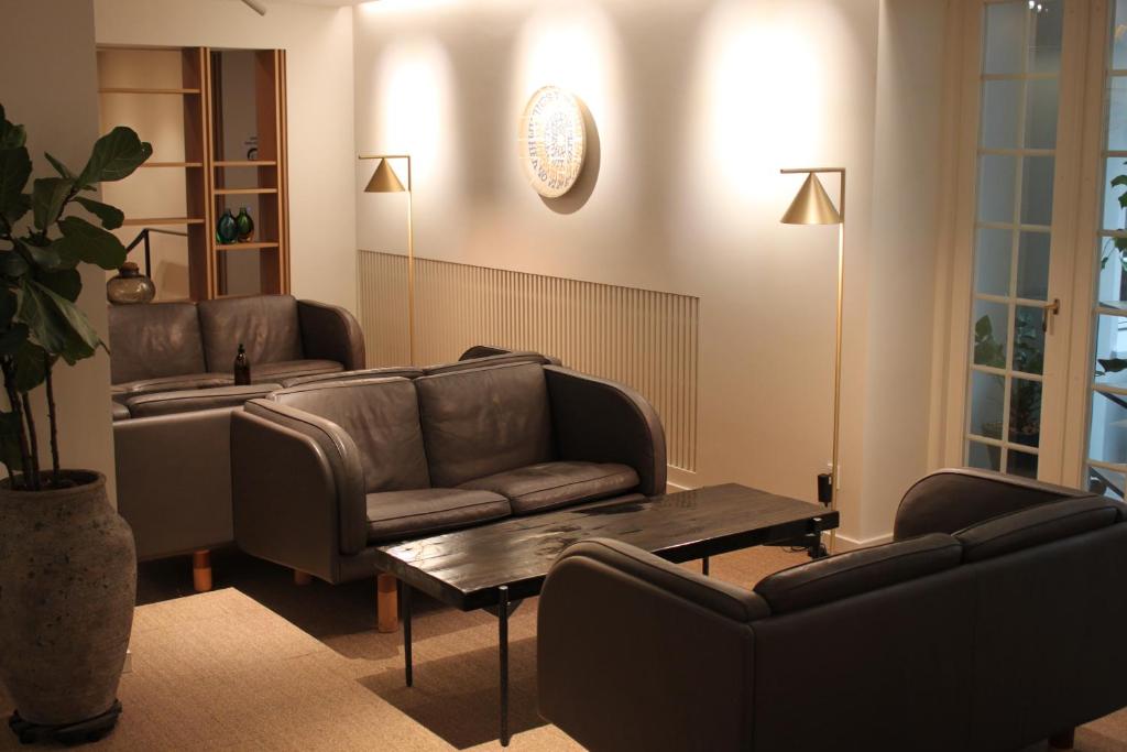 Posezení v ubytování Skarrildhus Sinatur Hotel & Konference