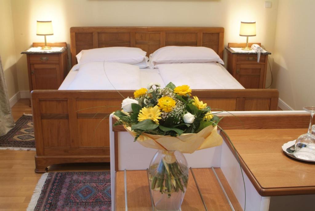 Postel nebo postele na pokoji v ubytování Hotel Villa Westend