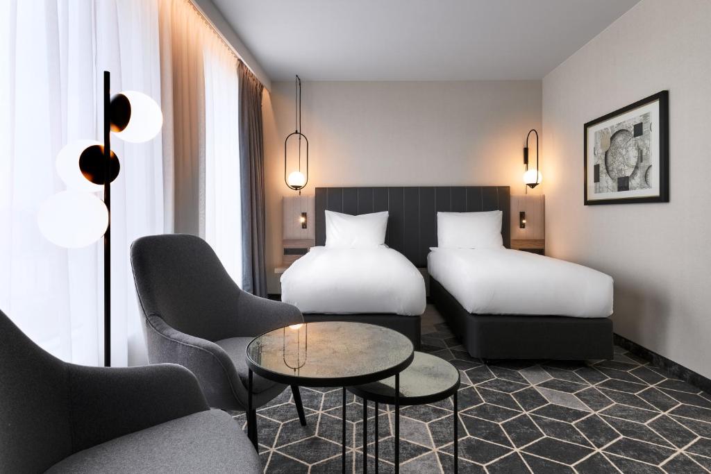 Crowne Plaza - Warsaw - The HUB by IHGにあるベッド