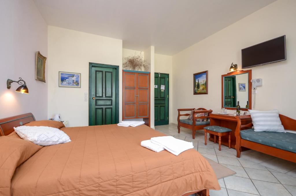 Postel nebo postele na pokoji v ubytování Apollon Hotel